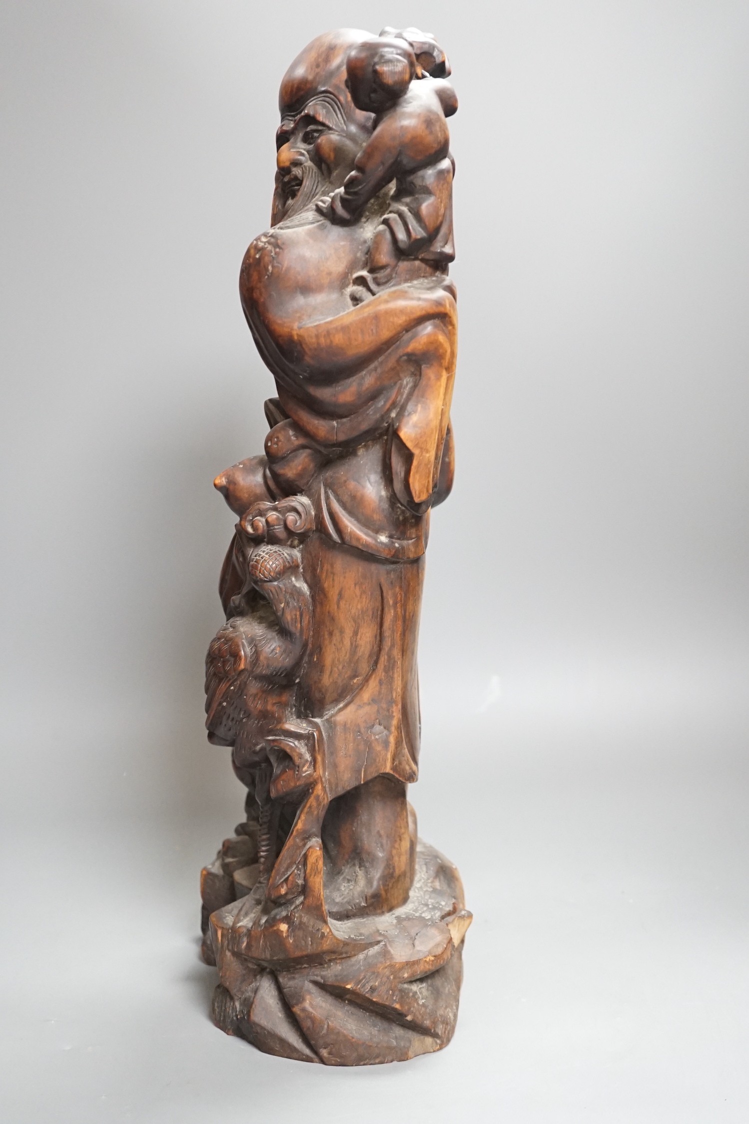A large early 20th century Chinese hongmu Shou Lao group, 46.5cms high